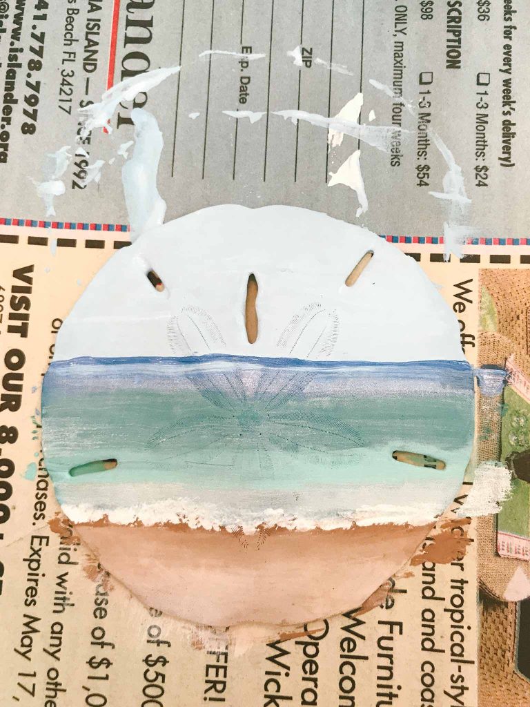 My sand dollar painting at The Shiny Fish Emporium in Anna Maria Island.