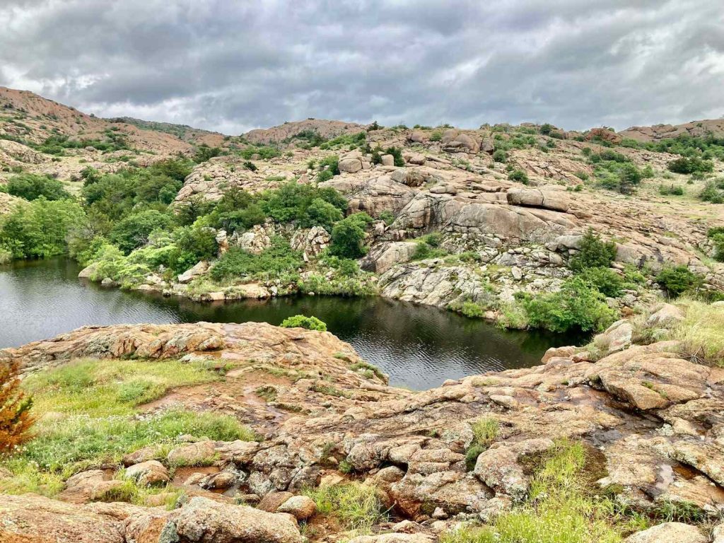Rocky terrain along a hiking area in the Wichita Mountains Wildlife Refuge.