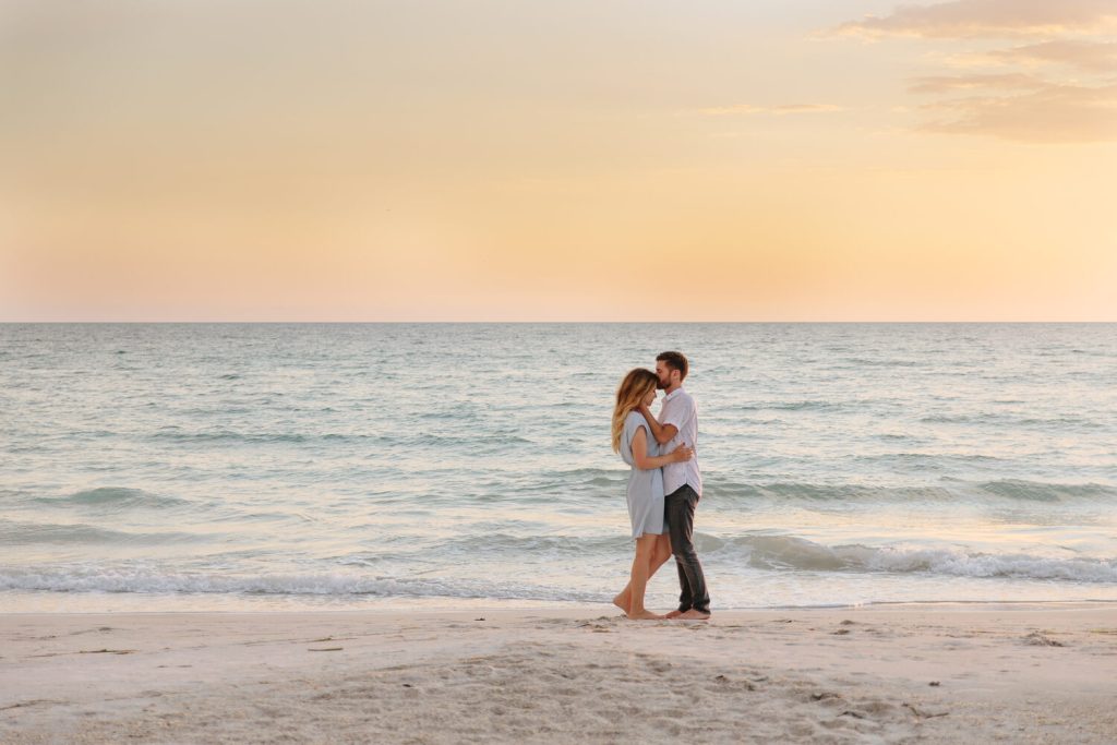 My husband and I on Anna Maria Island beach at sunset.
