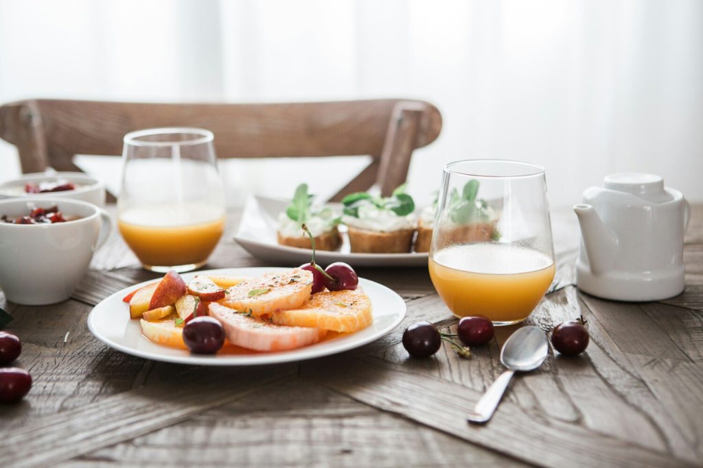 A beautifully set table filled with breakfast favorites.