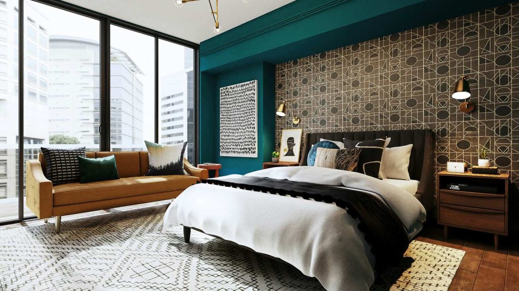 A beautiful moody bedroom with floor to ceiling windows and wallpaper on the wall behind the bed. The wallpaper is beautiful and really catches your eye.