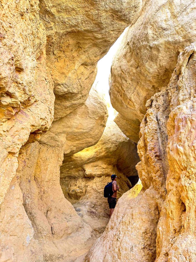 A portion of the Paint Mines where you can walk through towering rock formations that are golden in color. This is a great spot for a photo op.