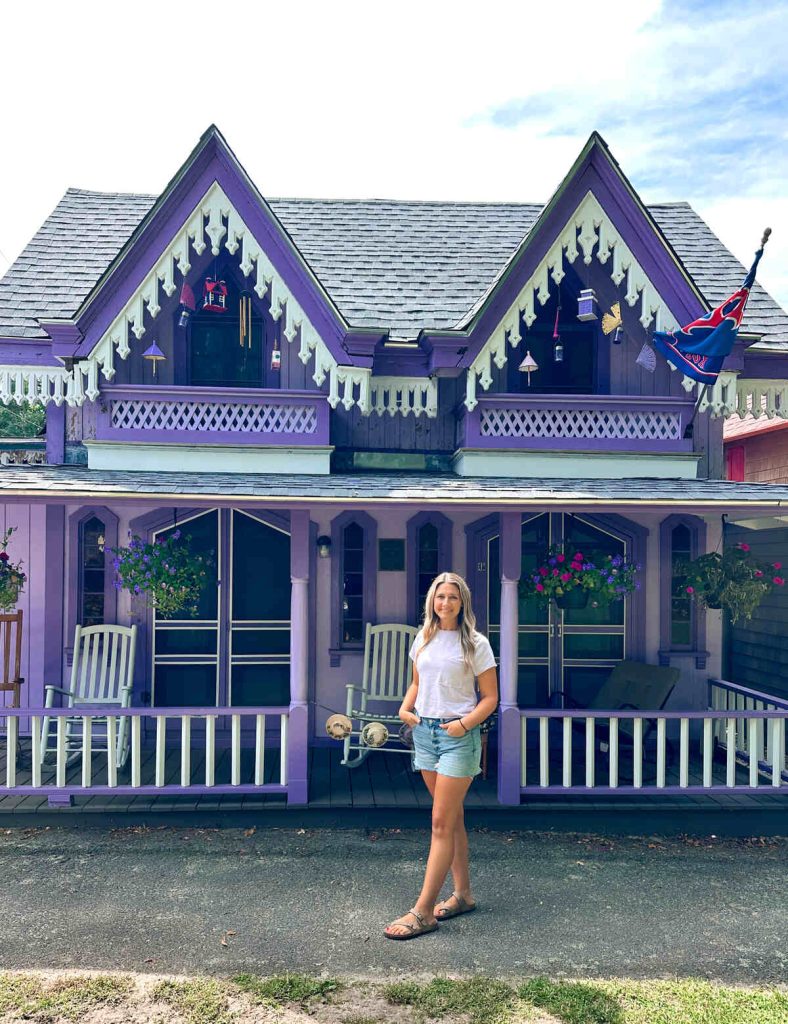 Me in front of a purple gingerbread house in Oak Bluffs, Martha's Vineyard.