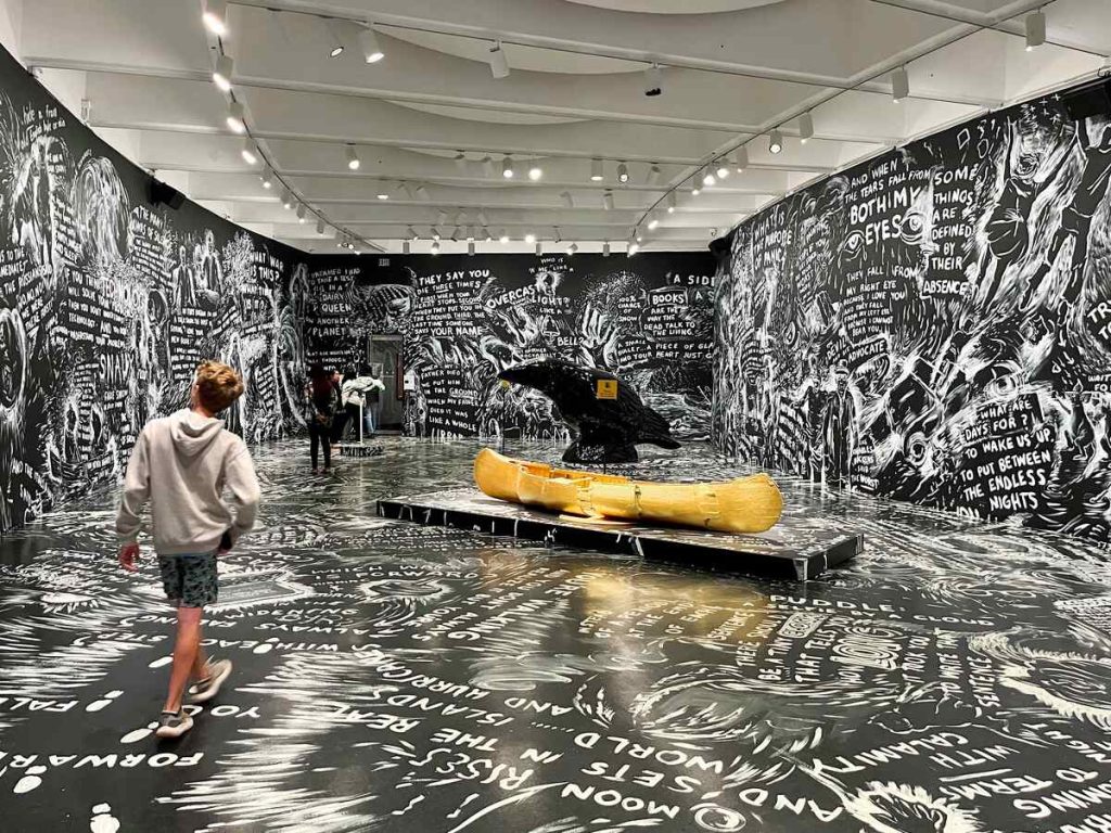 Black and white art display inside the Hirshhorn Museum.