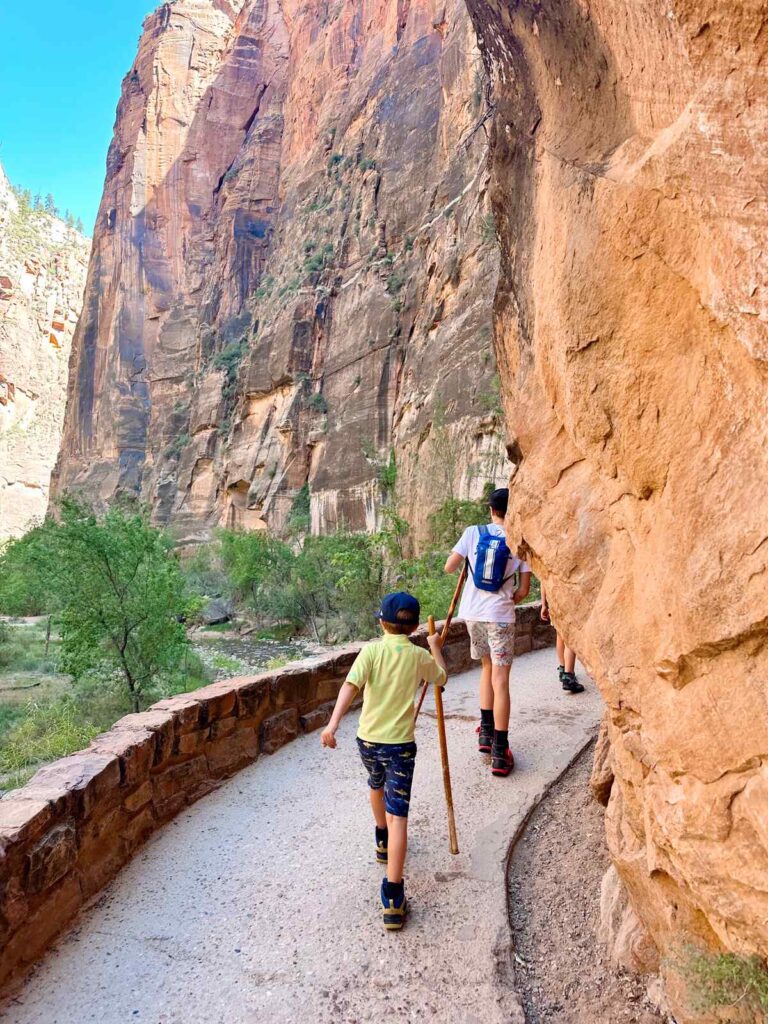 Our kids hiking along the Riverside Walk to get to the start of the Narrows.