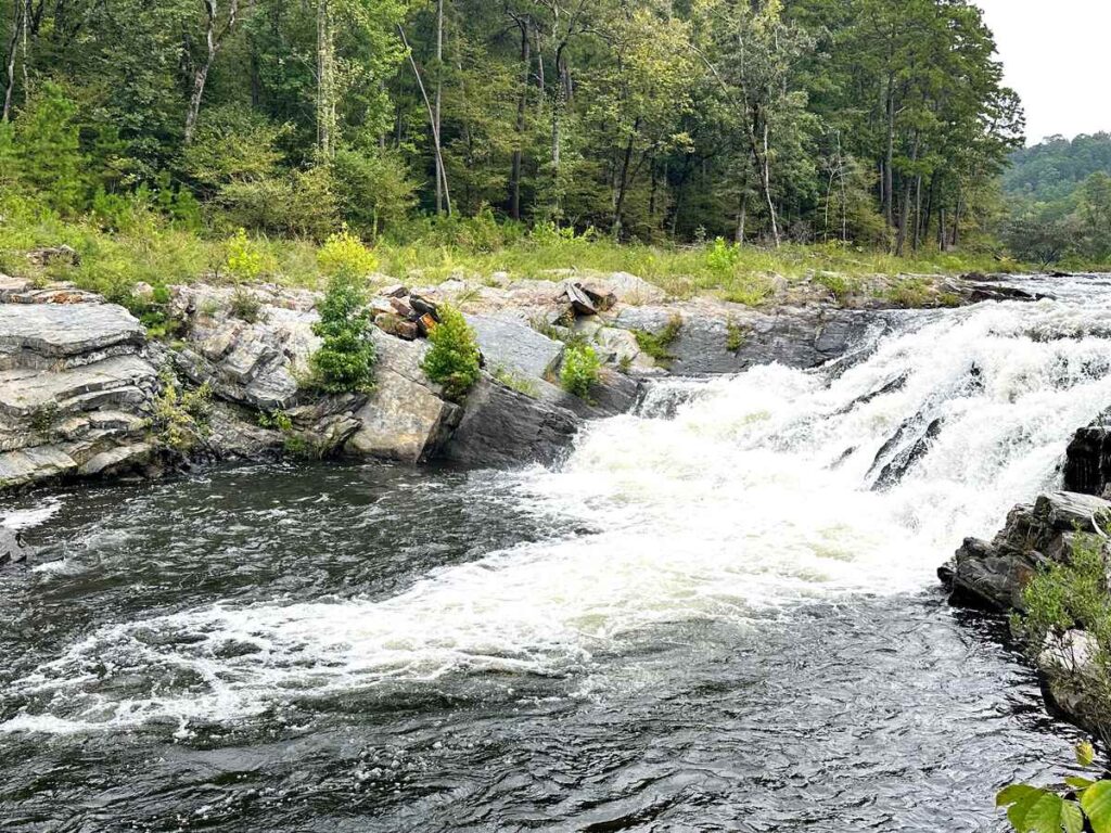 A rushing waterfall along Friends Trail Loop in Broken Bow. This is a great spot to stop and admire the beautiful scenery.