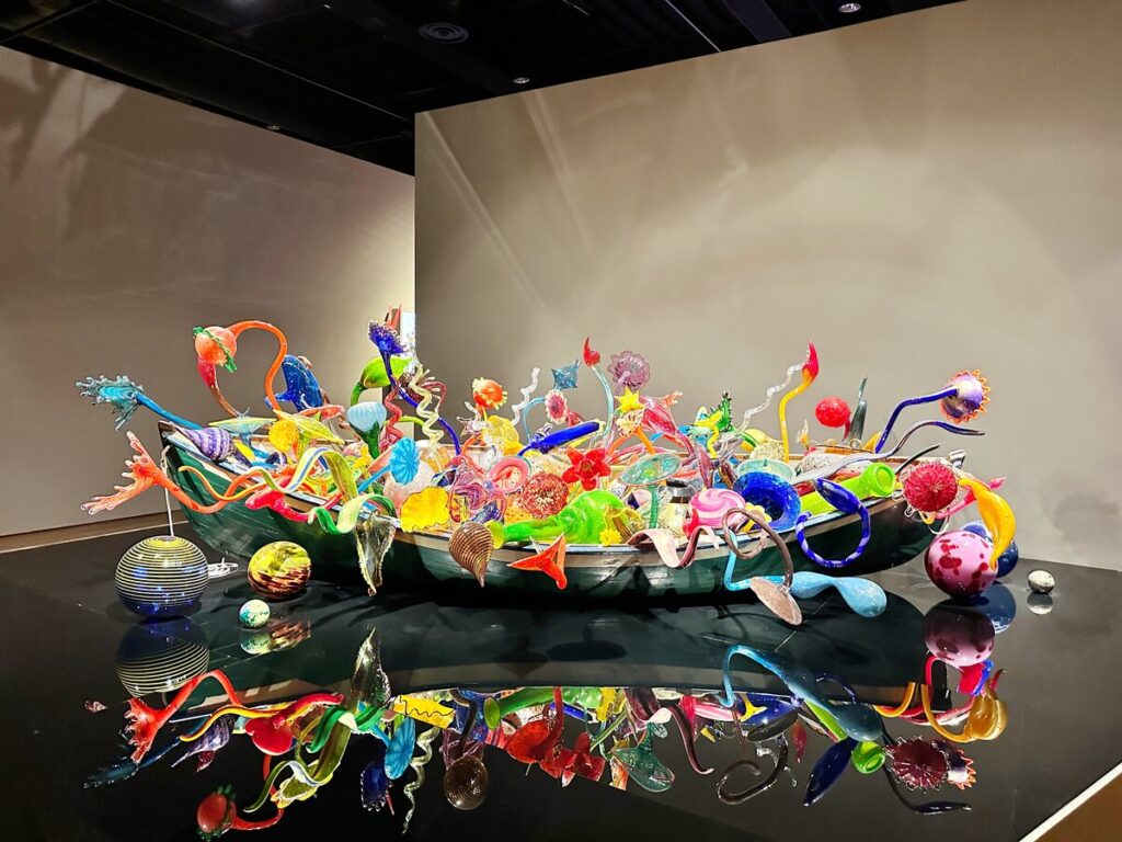 A large, colorful piece of glass artwork by Dale Chihuly on display at the Oklahoma City Museum of Art. This art museum has a very large collection of Dale Chihuly's work.