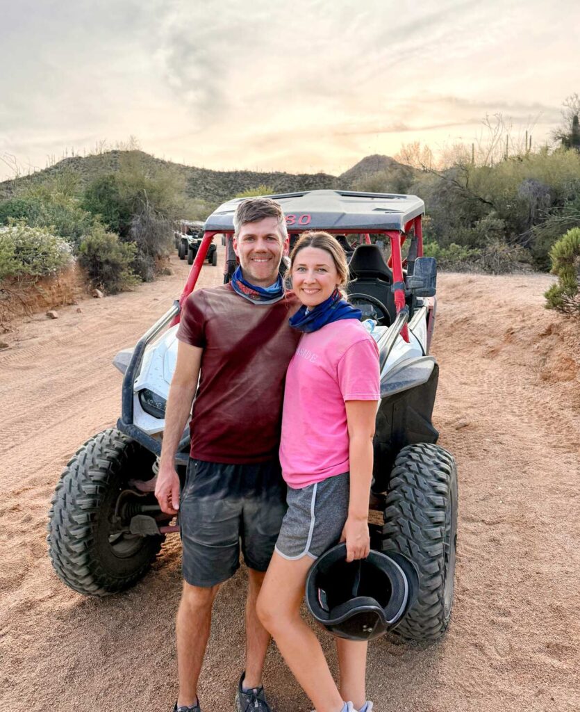 Austin and I standing in front of our ATV during our ATV tour near Scottsdale.